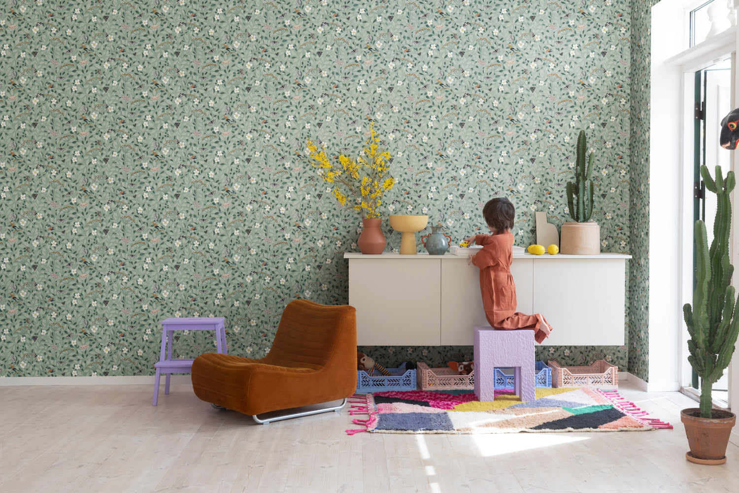 Pixie, Floral Pattern Wallpaper in kids bedroom with terracotta cushion and vase