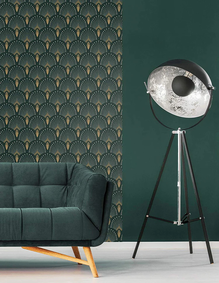 Lounge area with sofa and a coffee table with two rattan chairs, with 1920 fan wallpaper on the walls