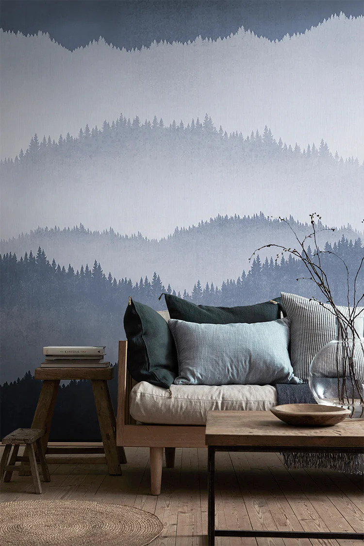 cool blue forest landscape wallpaper in living room