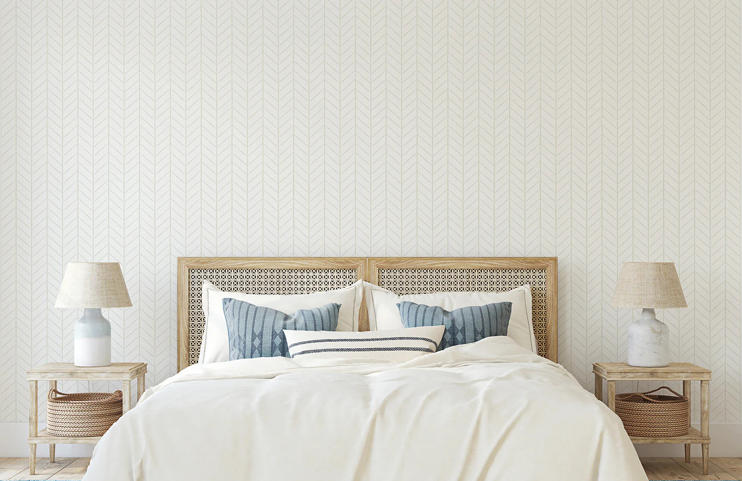 Light coloured furnishings in a lounge space with white sideboard and wood bench. Herringbone pattern wallpaper applied